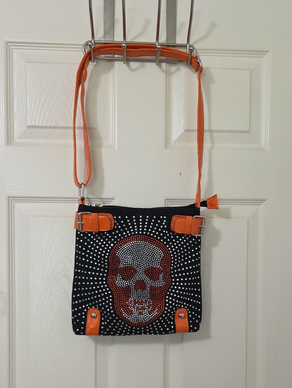 Black Crossbody Bag with Orange Trim and Crystal Skull
